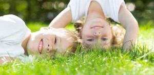 kids-playing-on-grass-612x300